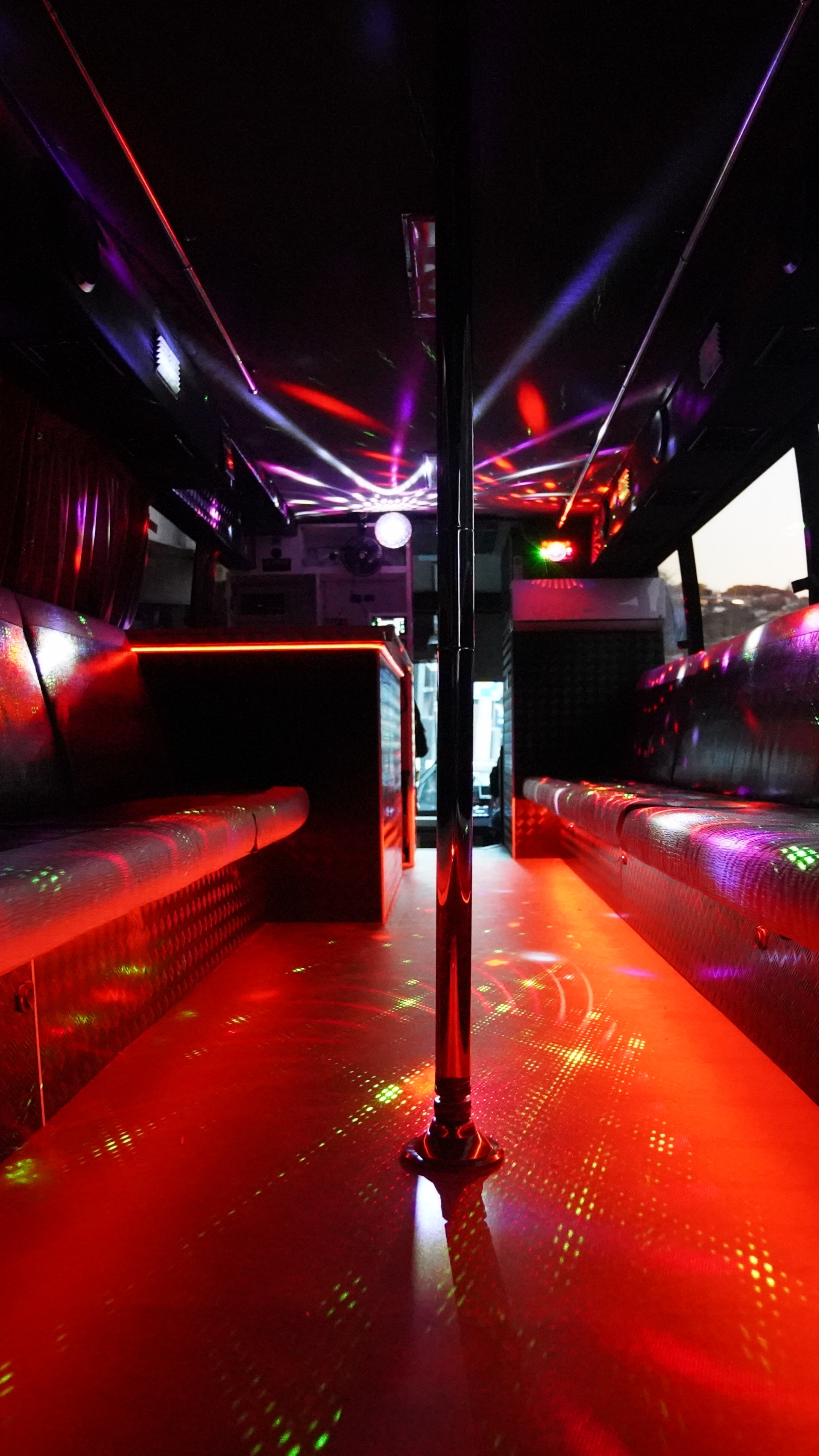 NSW Party and Rescue Fire Bus red party lighting interior