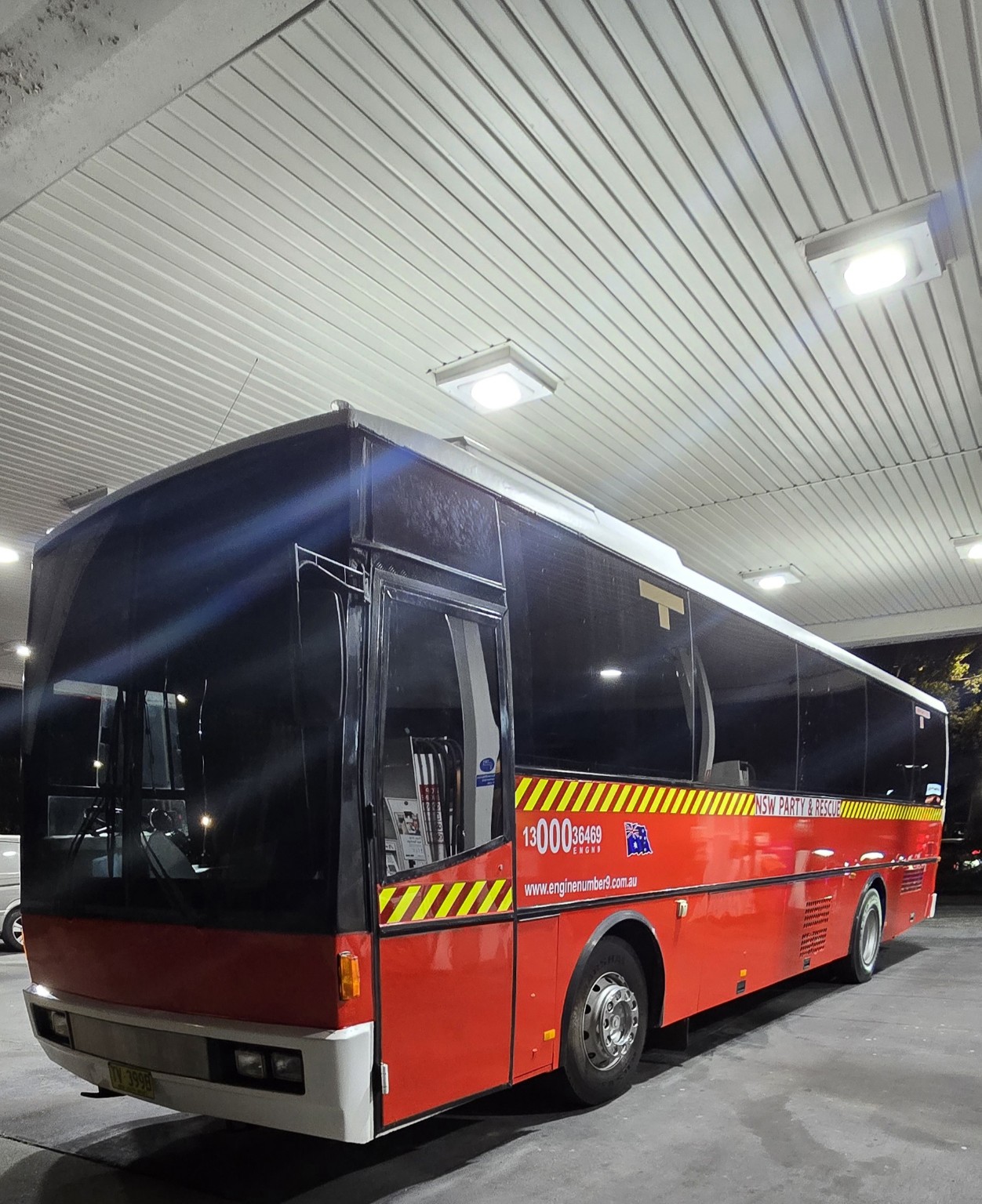 NSW Party and Rescue Fire Bus exterior at night in Sydney